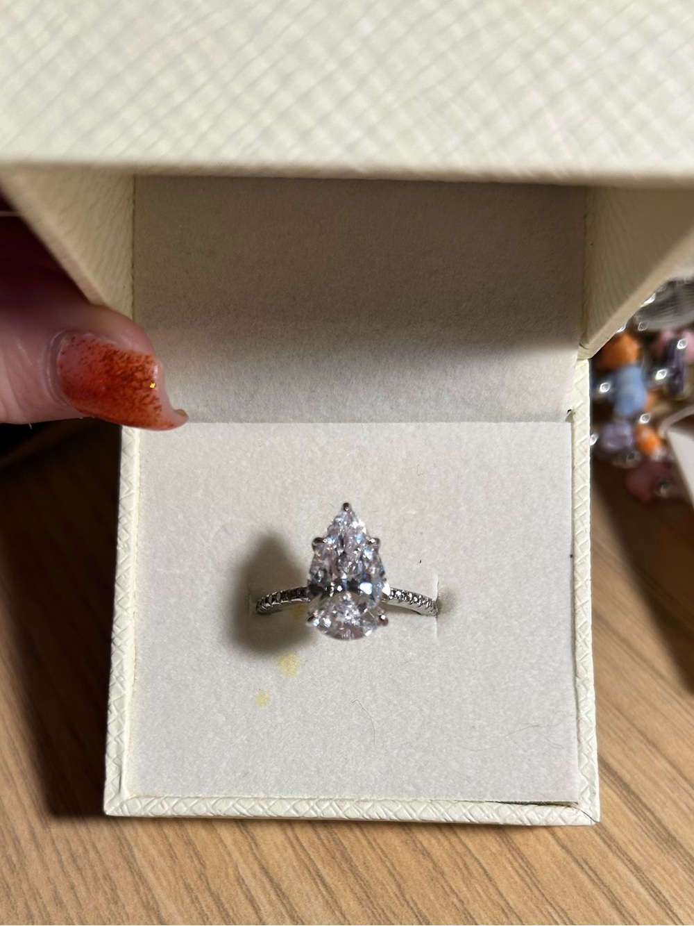 Pear-Shaped Clear Stone Silver Ring with Pavé Band